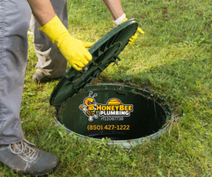 Sewer lid in a residential area, representing connection to a municipal sewer system